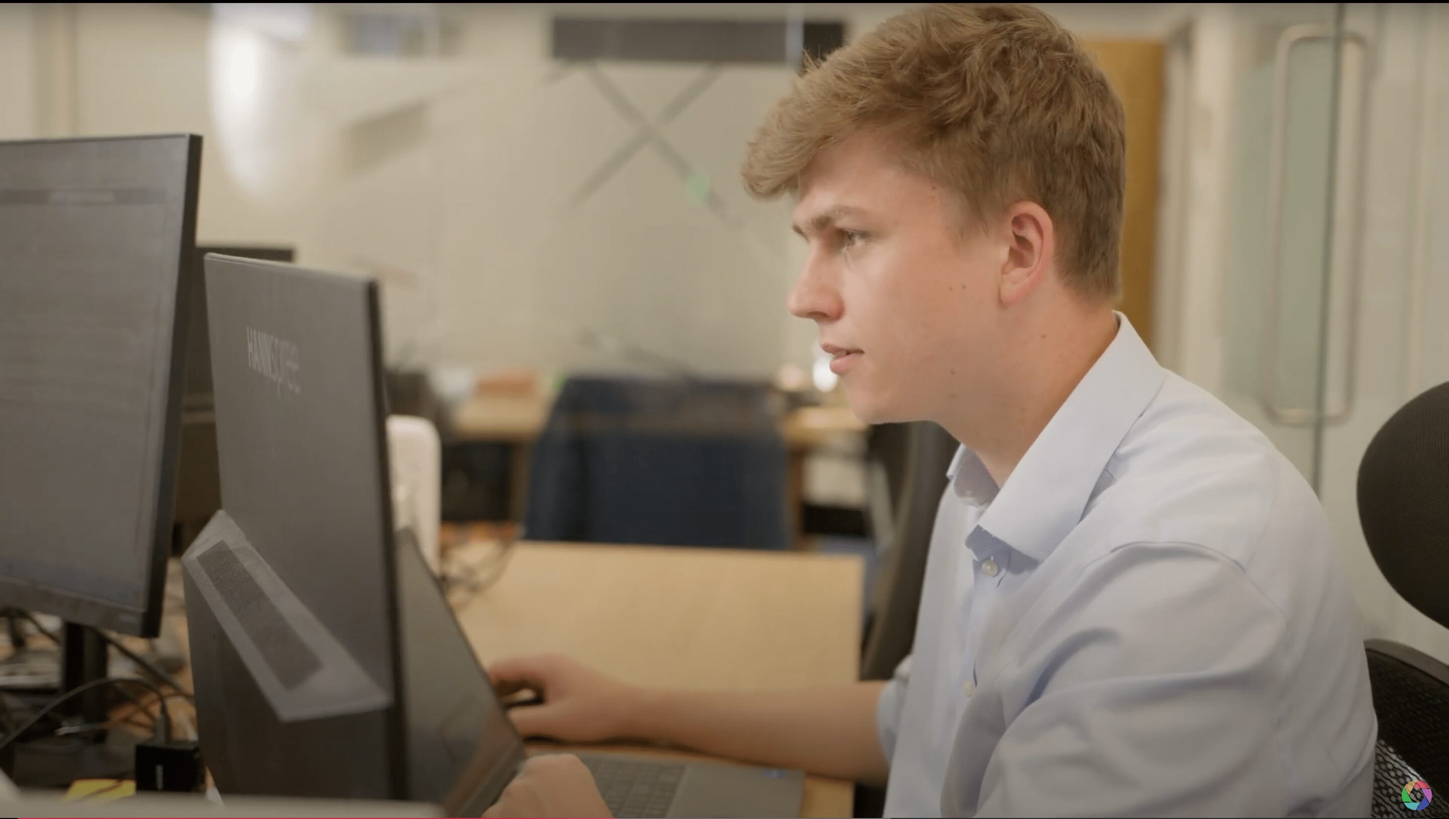 A business owner on camera in a corporate video designed to boost leads and online conversions.